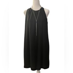 BCBGMAXAZRIA Beautiful Black Cocktail Dress with Pockets Size small.